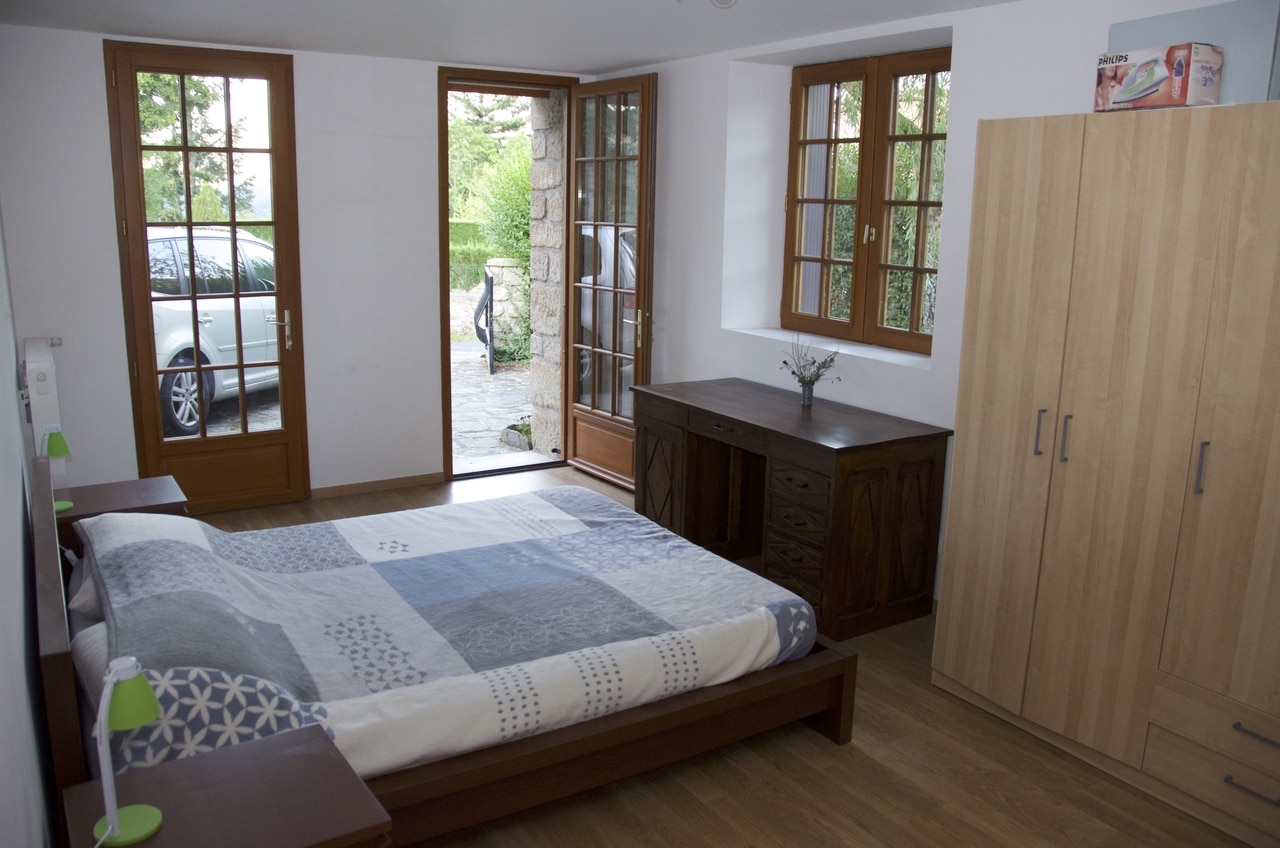 Downstairs Bedroom, showing French doors onto driveway